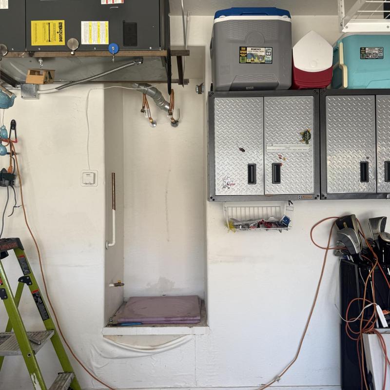 Water heater removal space in garage wall niche