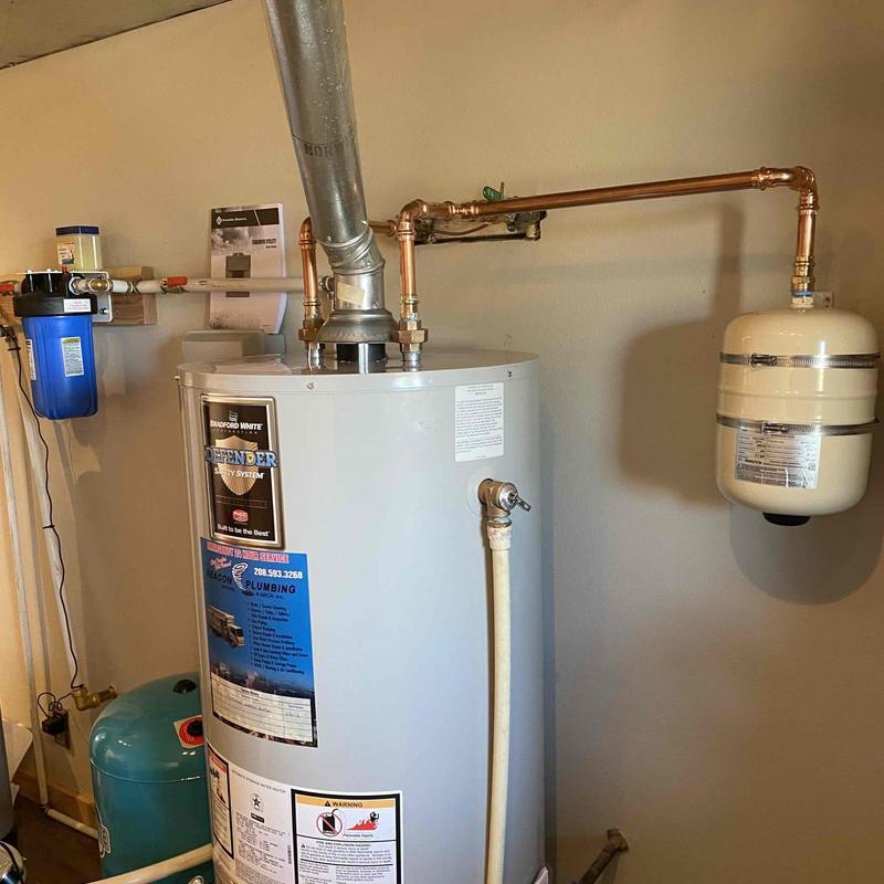 50-gallon gas water heater with expansion tank installed 50-gallon gas water heater with expansion tank installed