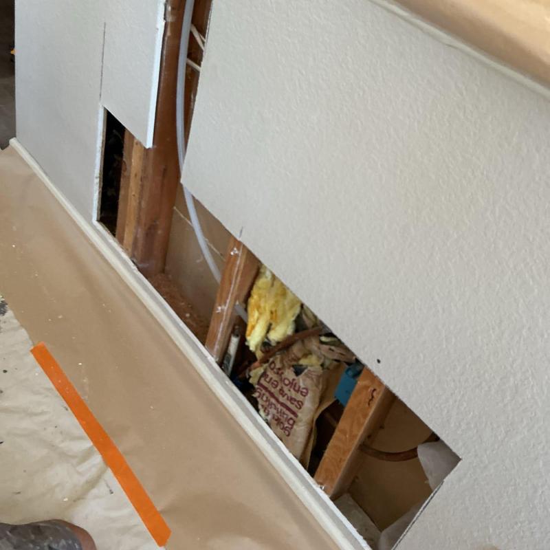 Copper water line reroute behind kitchen cabinets