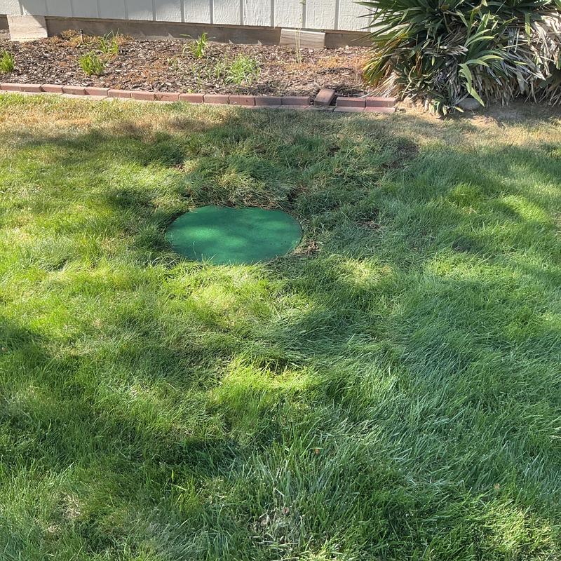 Septic tank inlet baffle and pipe with green lid Septic tank inlet baffle and pipe with green lid