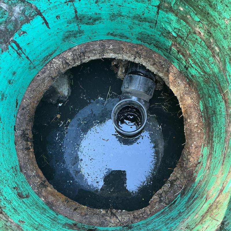 Septic tank inlet pipe and baffle installation view Septic tank inlet pipe and baffle installation view