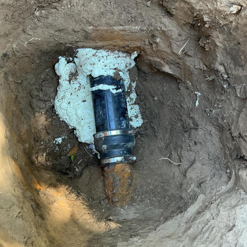 Septic tank inlet pipe and baffle installation in ground Septic tank inlet pipe and baffle installation in ground