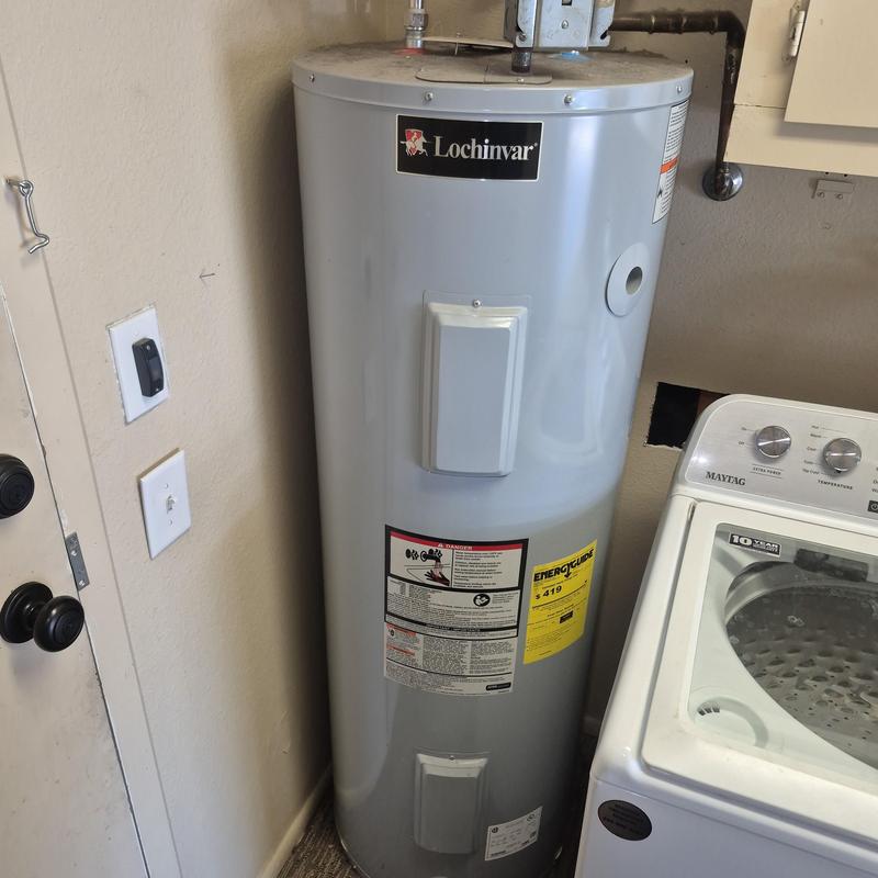 Water heater with electrical element access panels