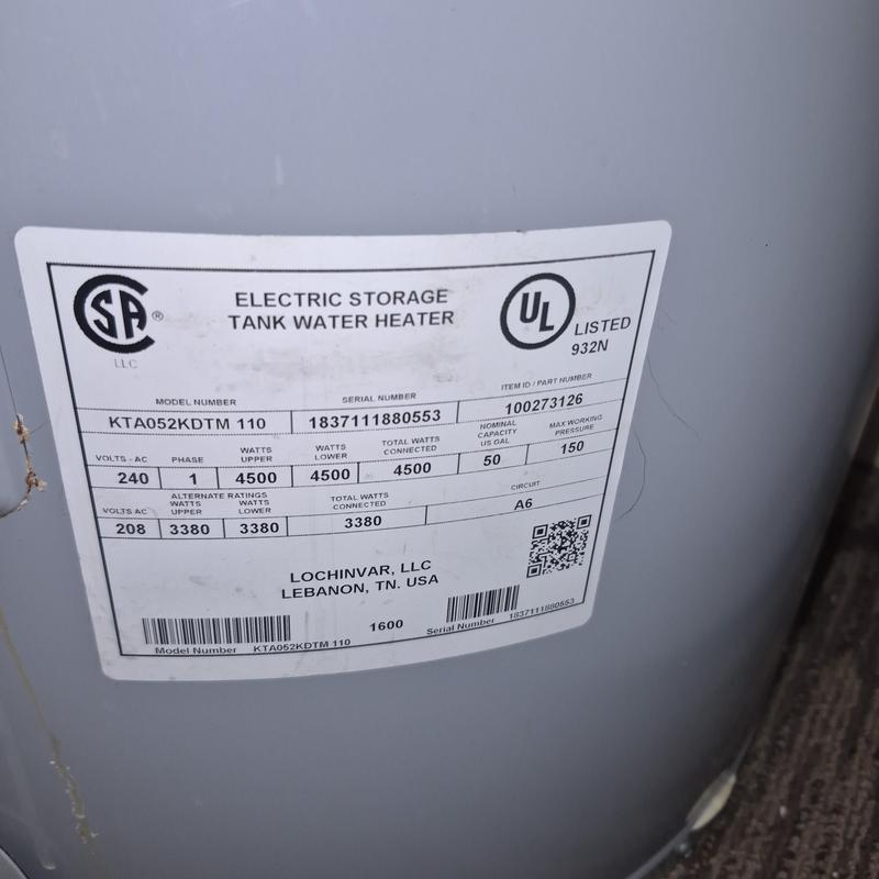 Electric storage tank water heater label close-up