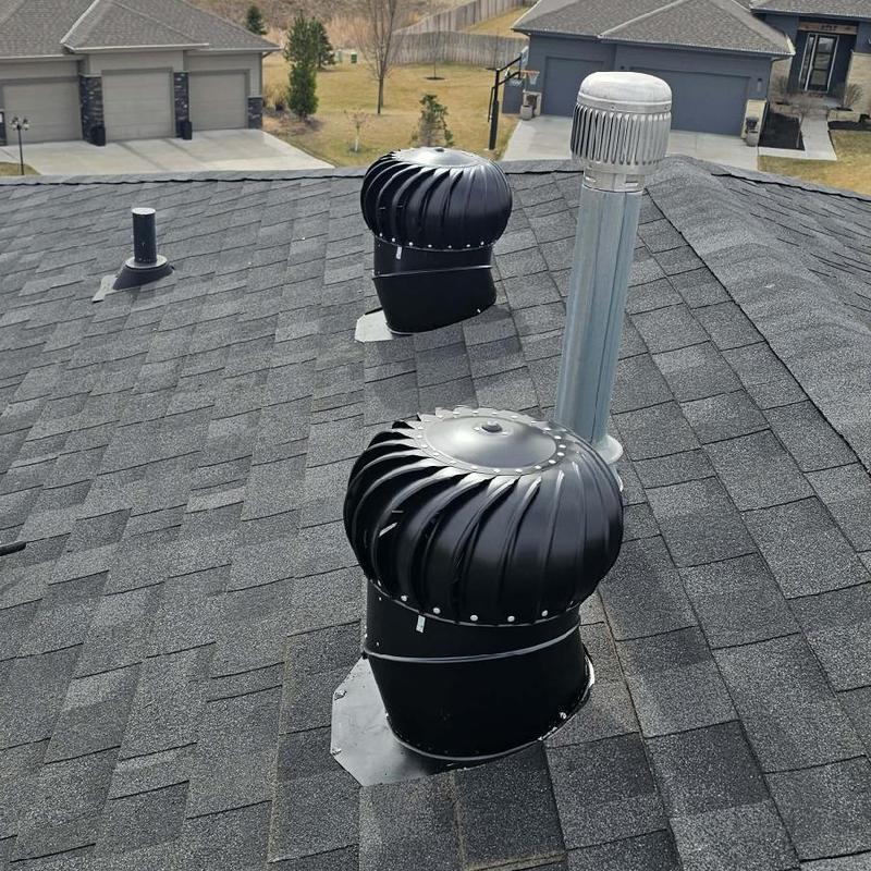 Turbine vents installed on asphalt shingle roof Turbine vents installed on asphalt shingle roof