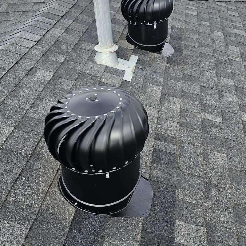 Roof turbines installed replacing power vents on shingles Roof turbines installed replacing power vents on shingles