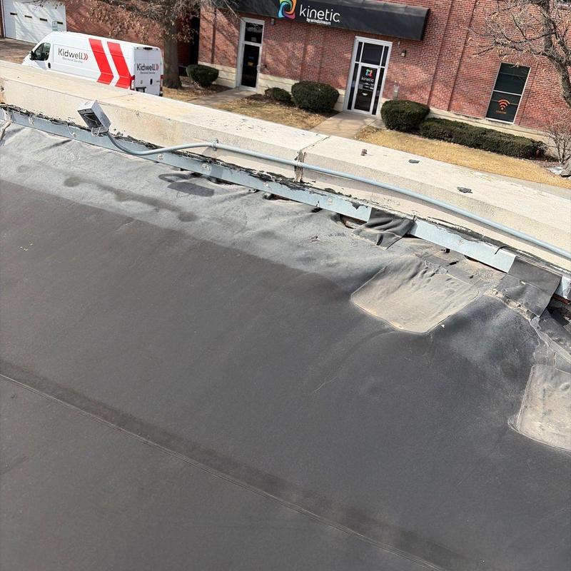 Carlisle EPDM roof membrane with edge damage Carlisle EPDM roof membrane with edge damage