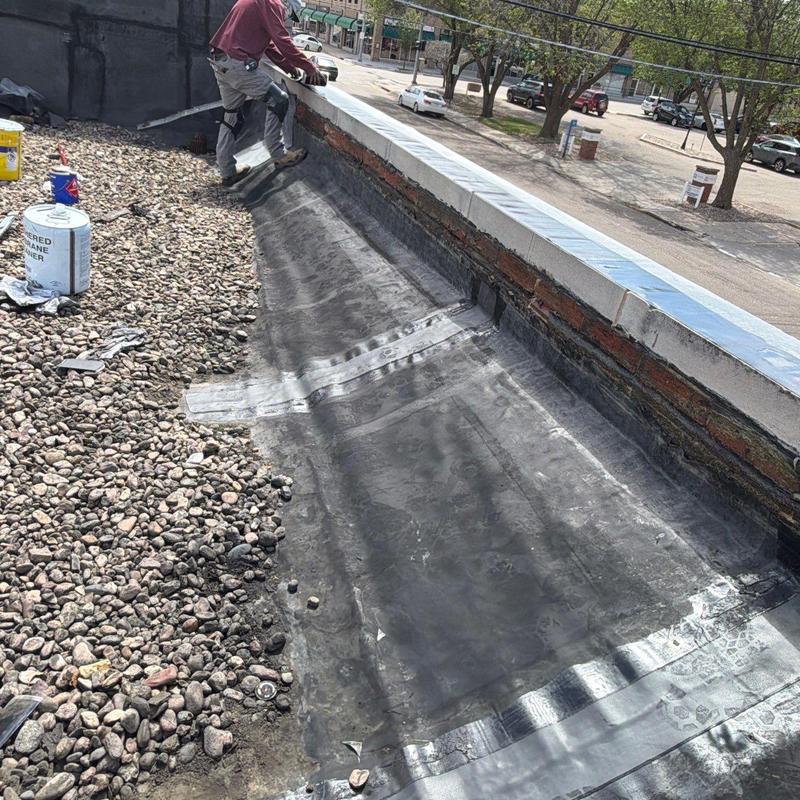 Carlisle EPDM roofing membrane repair on flat roof Carlisle EPDM roofing membrane repair on flat roof