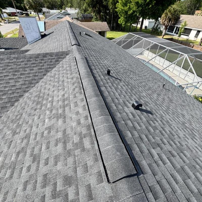 Architectural shingle roof with continuous ridge vent Architectural shingle roof with continuous ridge vent