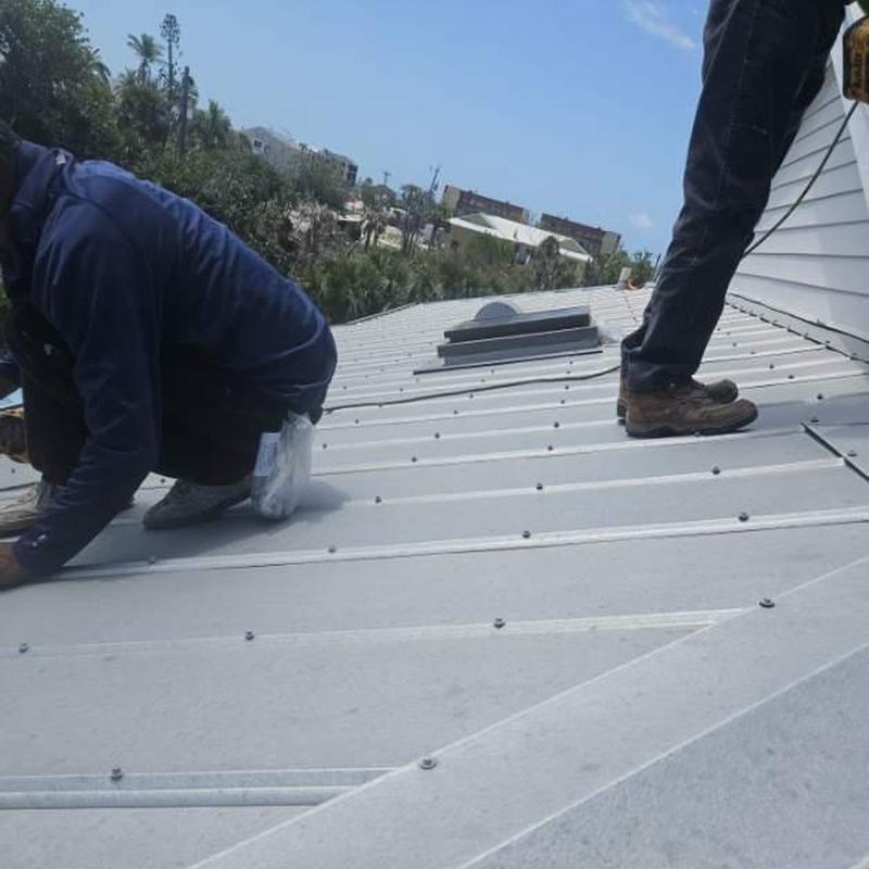 5V crimp metal roof with new fasteners installation 5V crimp metal roof with new fasteners installation