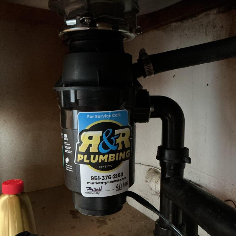 Moen garbage disposal with plumbing connections under sink