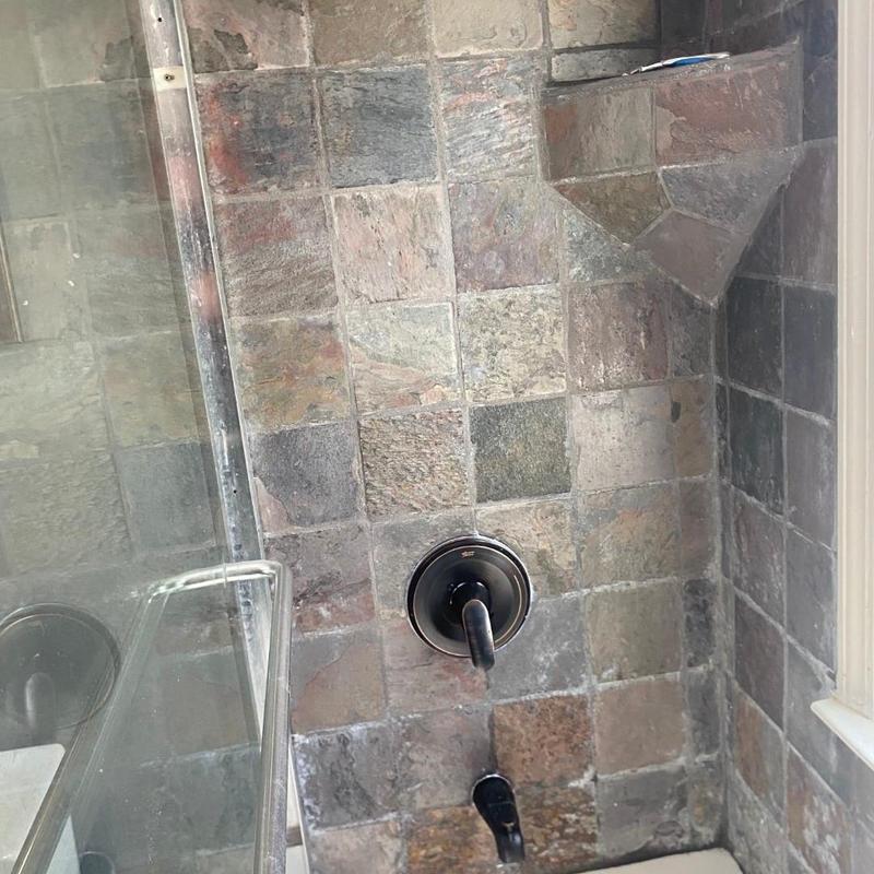 Shower valve and handle installed on tiled wall