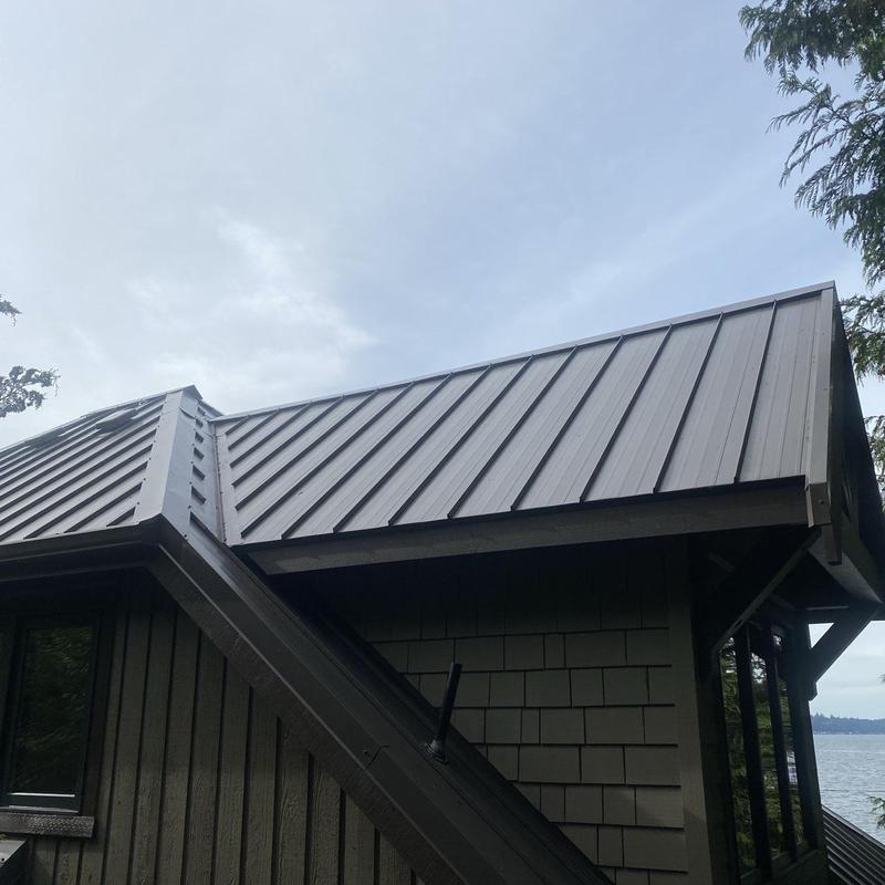 Metal roof with clean panels and ridges