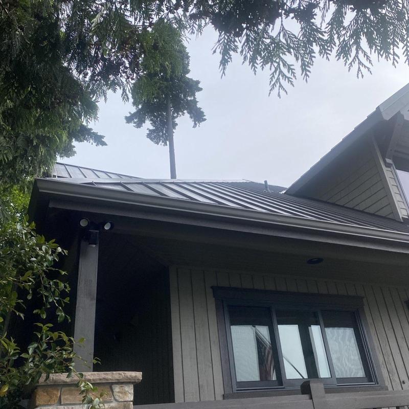 Metal roof cleaning and pressure washing detail
