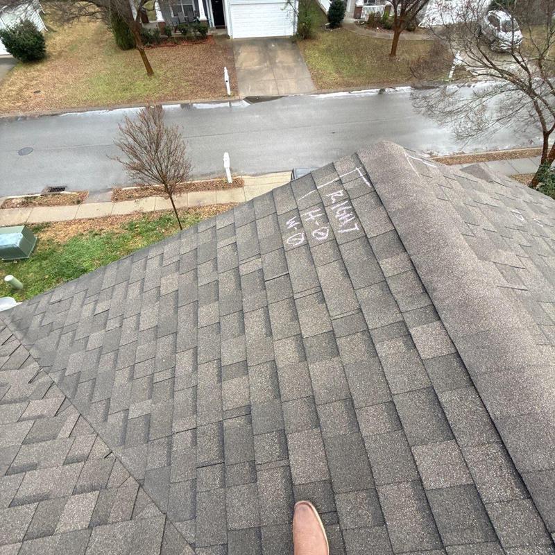 Asphalt shingles with hail damage markings