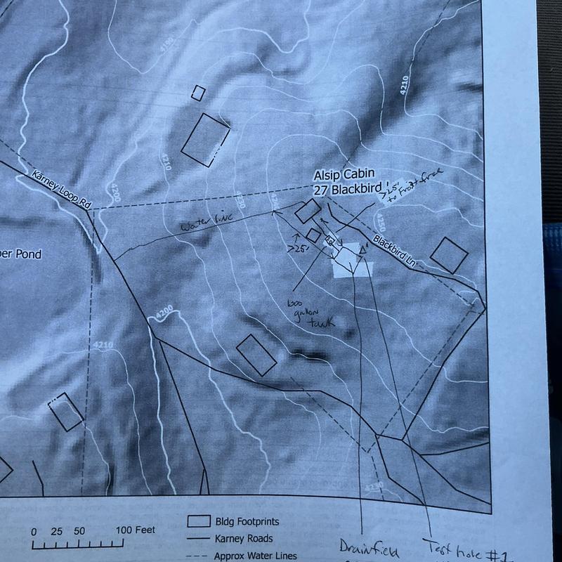 Drain field layout map with building footprints and roads