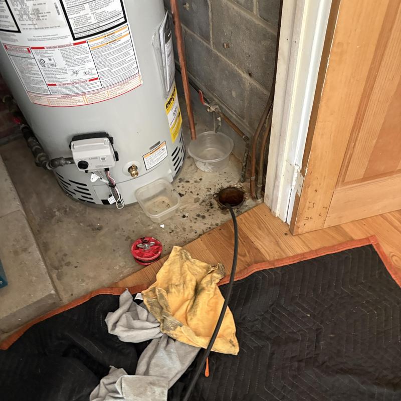 Water heater drain line with jetting hose and tools Water heater drain line with jetting hose and tools