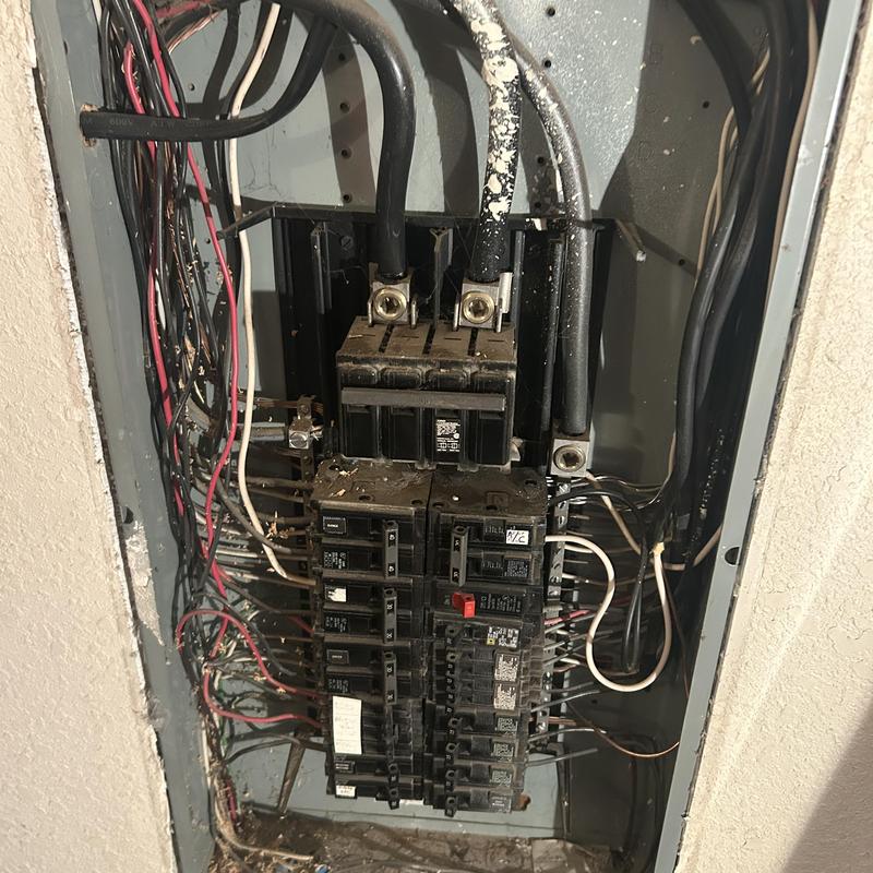Electrical panel with improperly installed shared neutral circuits Electrical panel with improperly installed shared neutral circuits