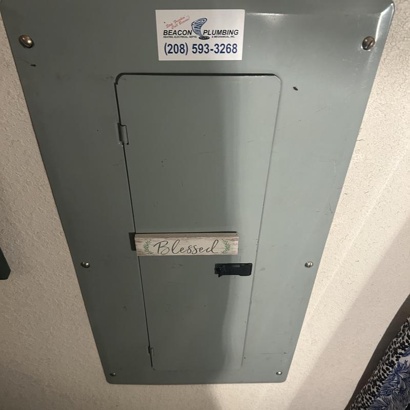 Electrical panel with inspection sticker and label Electrical panel with inspection sticker and label