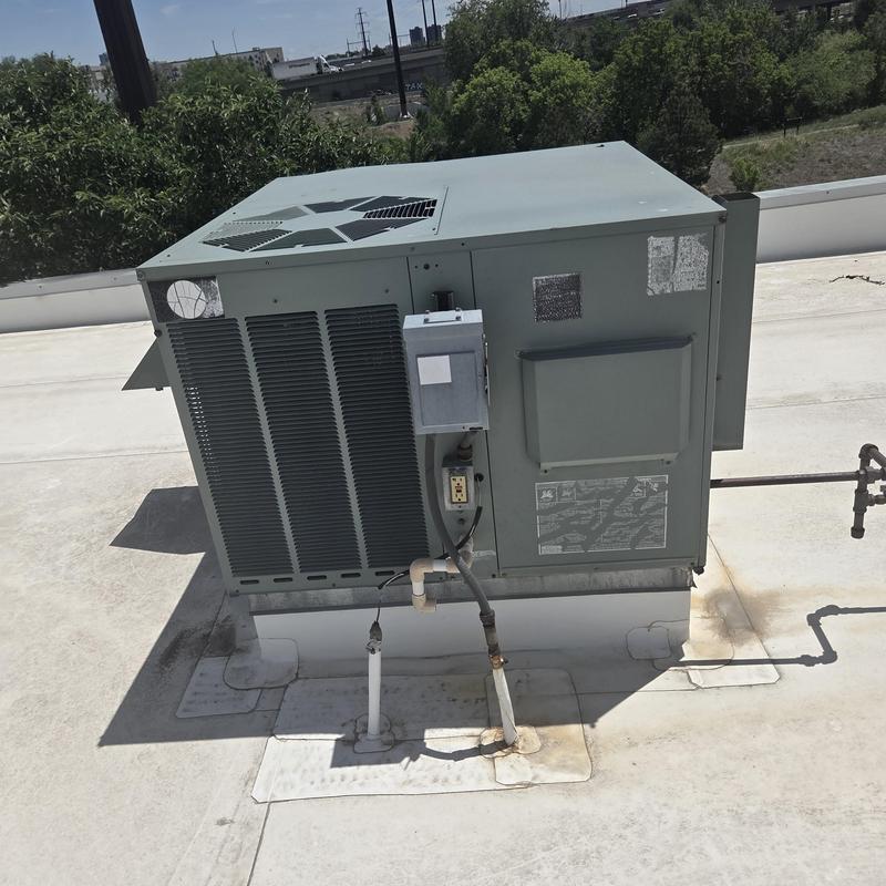 Rooftop HVAC unit with gas line and electrical box Rooftop HVAC unit with gas line and electrical box