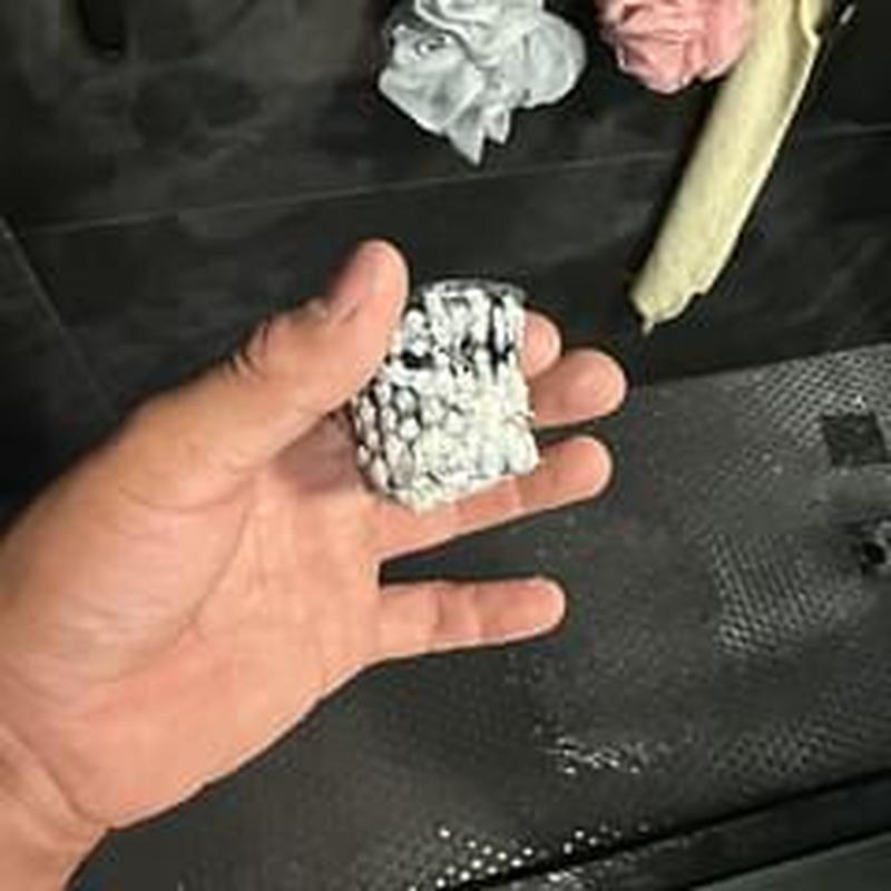 Shower drain strainer clogged with debris removal