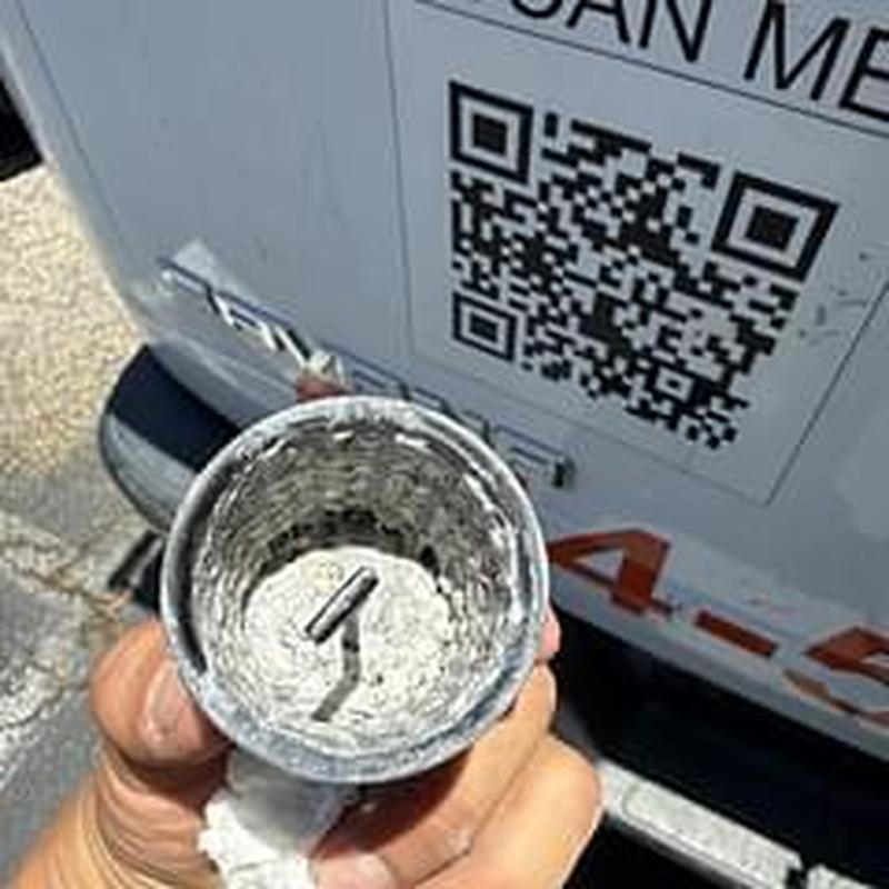 Shower drain strainer removed for clear drainage