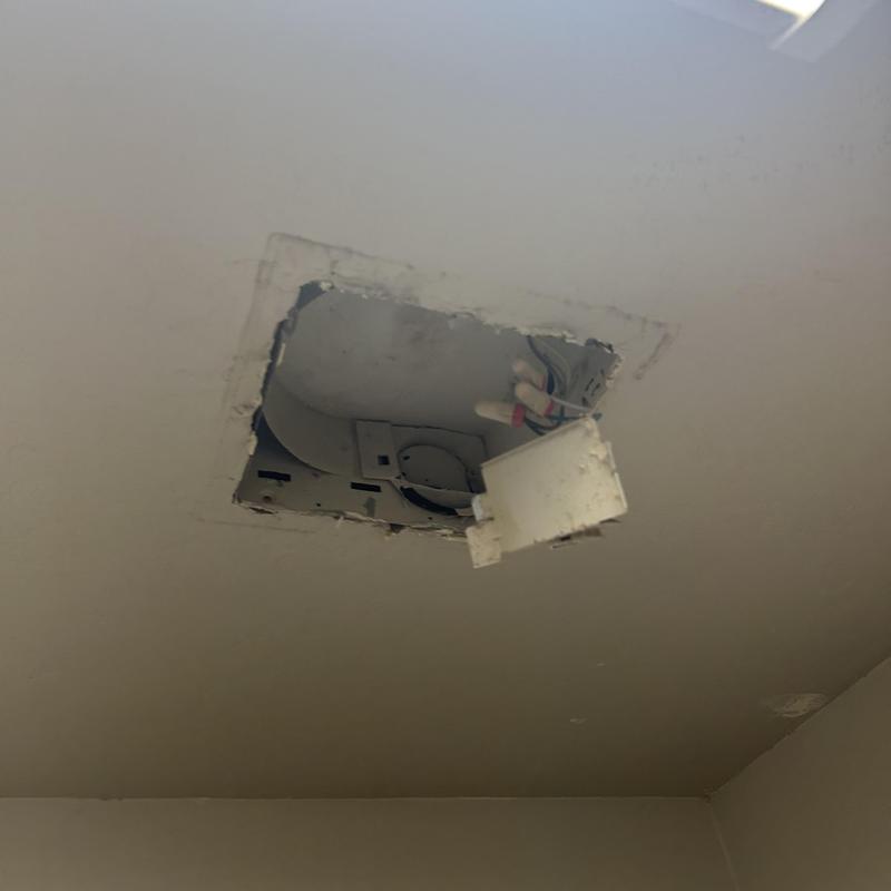 Bathroom exhaust fan mounting box with wiring exposed Bathroom exhaust fan mounting box with wiring exposed