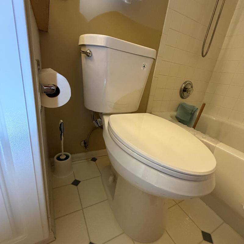 Toilet with 1.28 GPM water-efficient flush installed Toilet with 1.28 GPM water-efficient flush installed