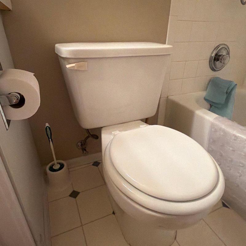 Toilet with 1.28 GPM flush replacing older leaking unit Toilet with 1.28 GPM flush replacing older leaking unit