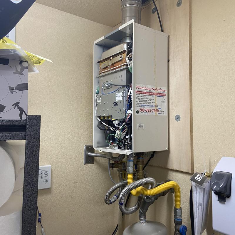 Tankless water heater internal components and piping Tankless water heater internal components and piping