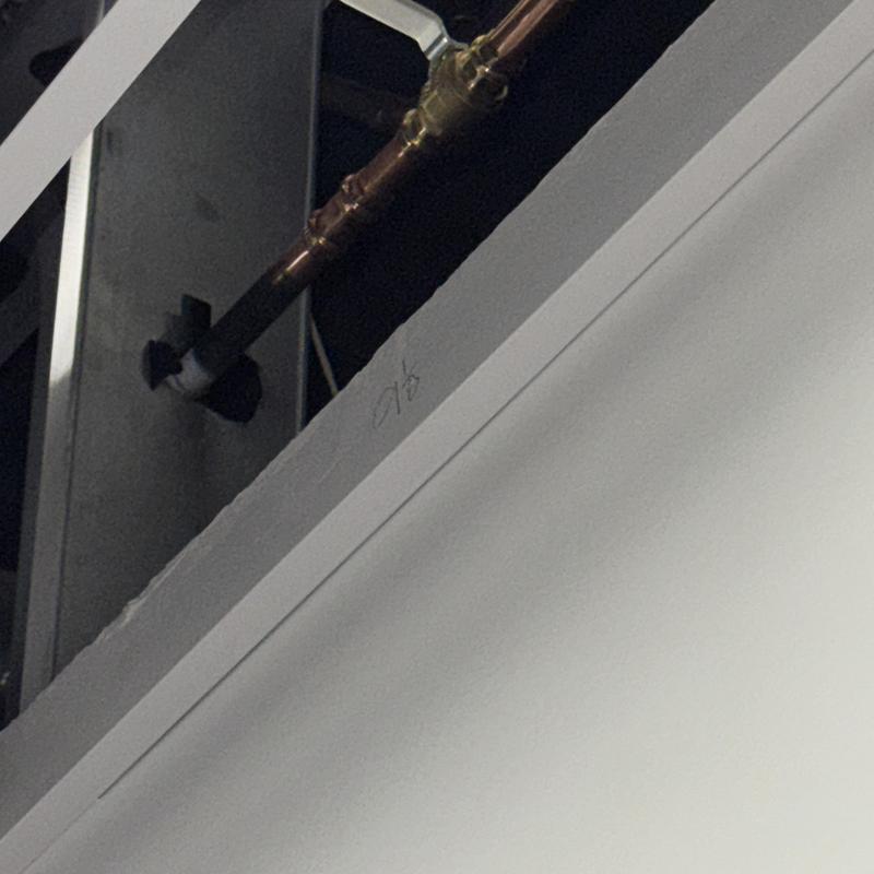 Main shut off valve with pipe freezing in commercial ceiling Main shut off valve with pipe freezing in commercial ceiling