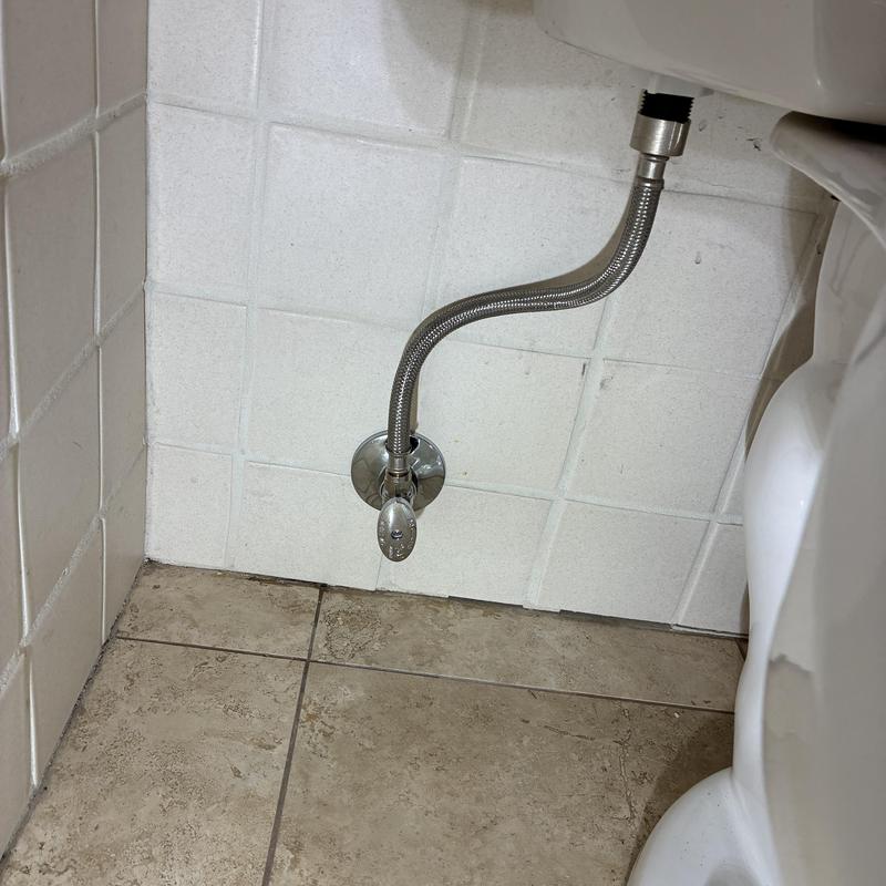 Toilet water supply line and angle stop installation