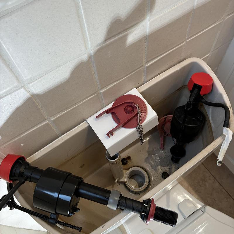 Toilet fill valve and flapper replacement inside tank