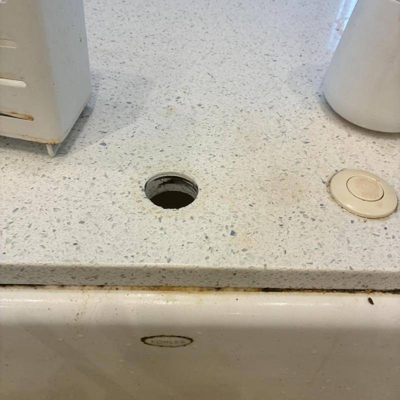 Kitchen sink countertop with missing faucet hole