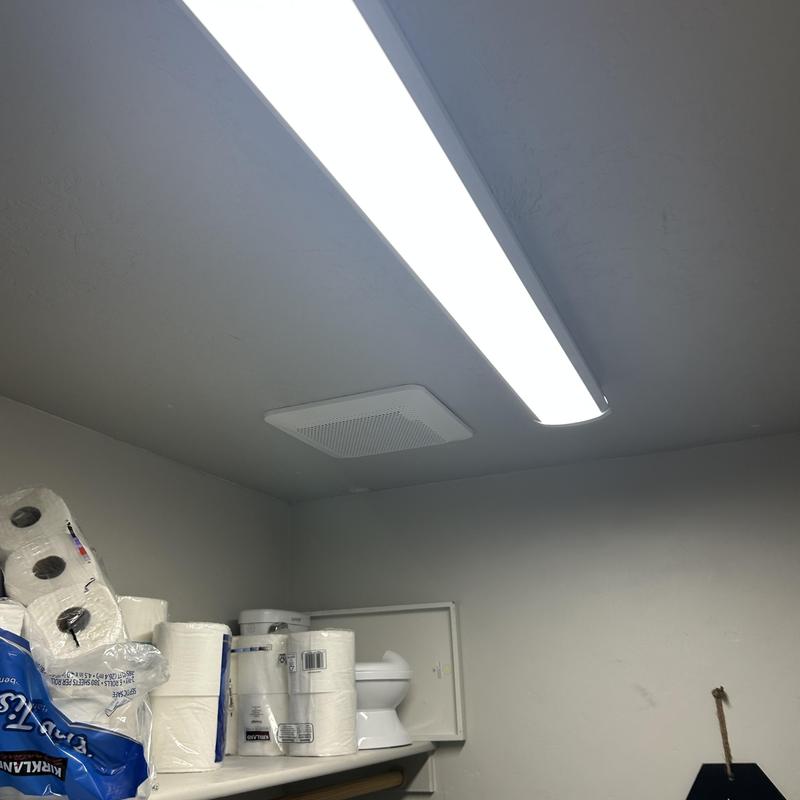 Bathroom exhaust fan with LED ceiling light in storage room Bathroom exhaust fan with LED ceiling light in storage room