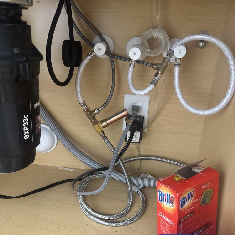 Kitchen faucet hot and cold water line switch under sink