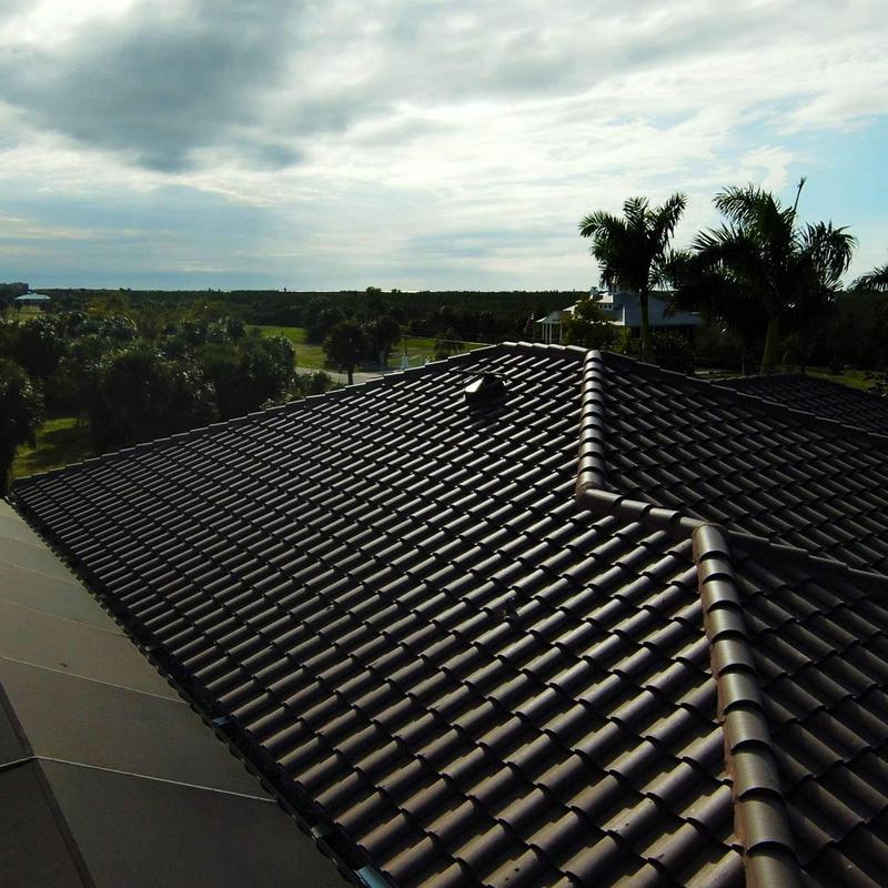 Concrete tile roof with foam-adhered system installation Concrete tile roof with foam-adhered system installation