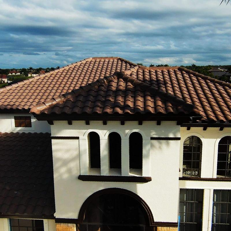Concrete tile roof with foam-adhered system Concrete tile roof with foam-adhered system