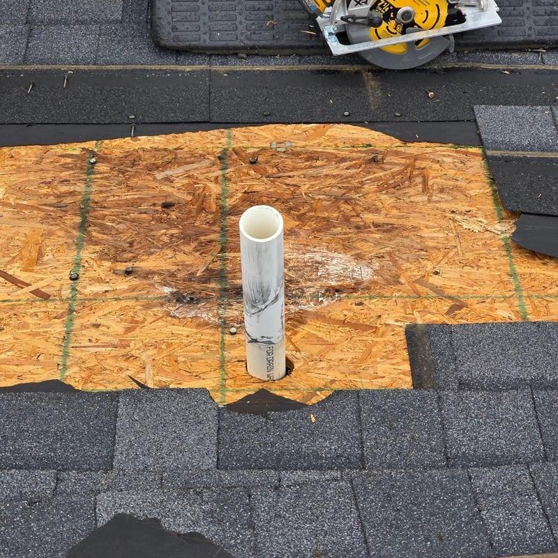 Pipe boot area with replaced OSB decking and shingles