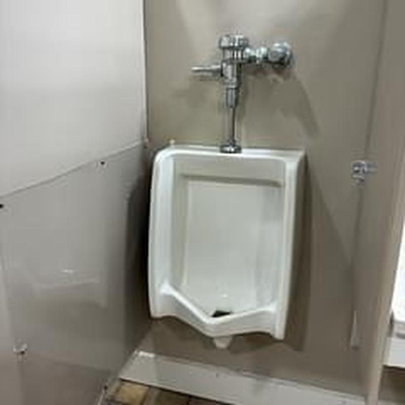 Urinal flange and flushometer fixture installation Urinal flange and flushometer fixture installation