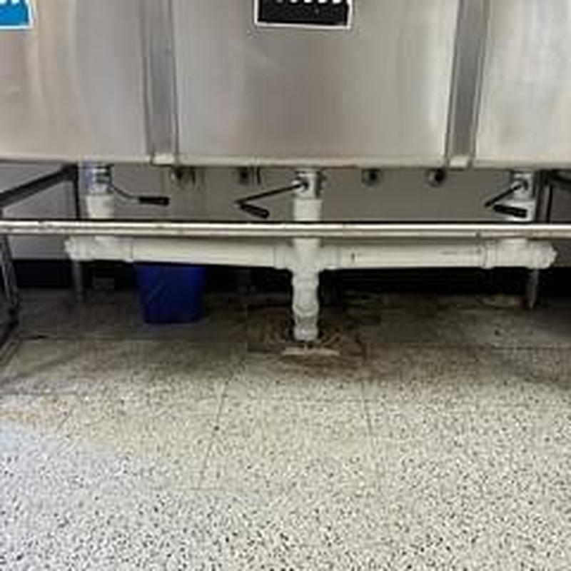 Lever drain system under commercial kitchen sink Lever drain system under commercial kitchen sink