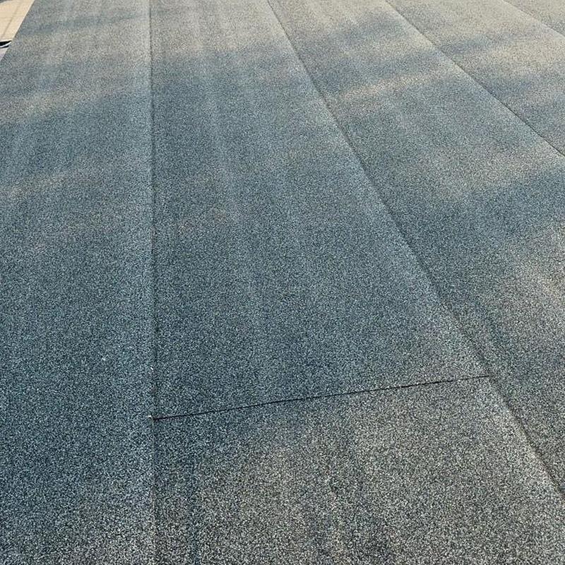 Modified bitumen roof with tapered insulation system Modified bitumen roof with tapered insulation system