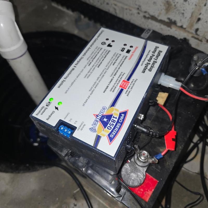 Battery backup sump pump system installation