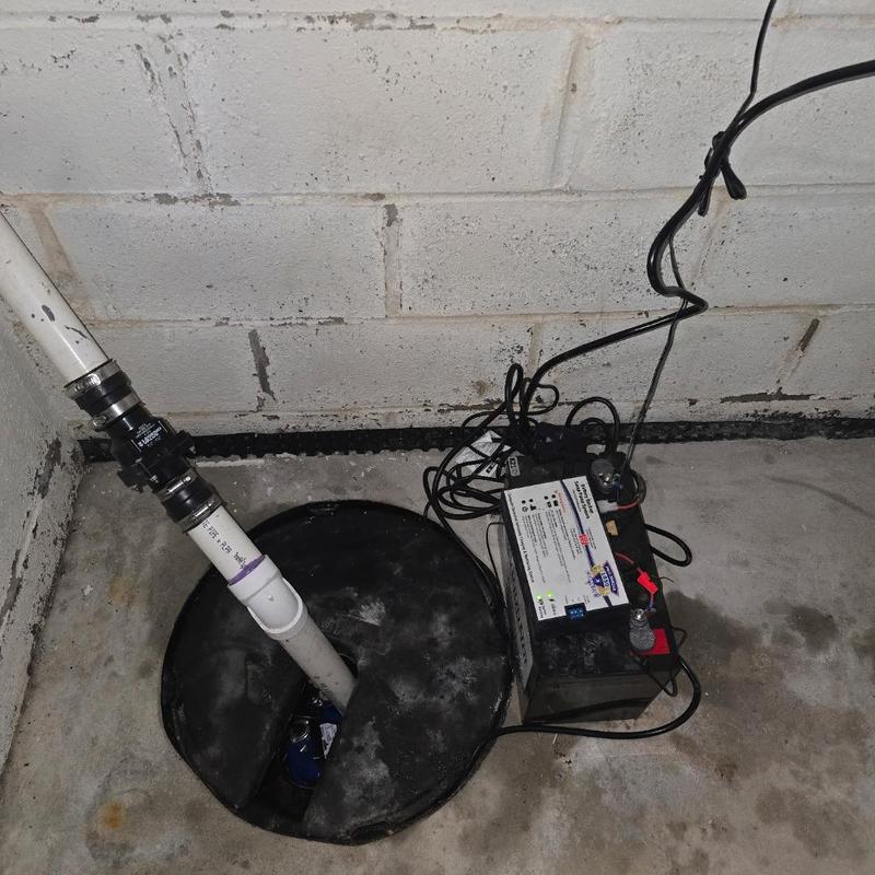 Battery backup combo sump pump installation in basement
