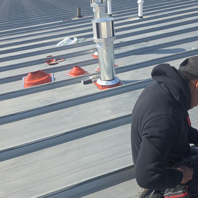 HT pipe boots installation on metal roof panels HT pipe boots installation on metal roof panels