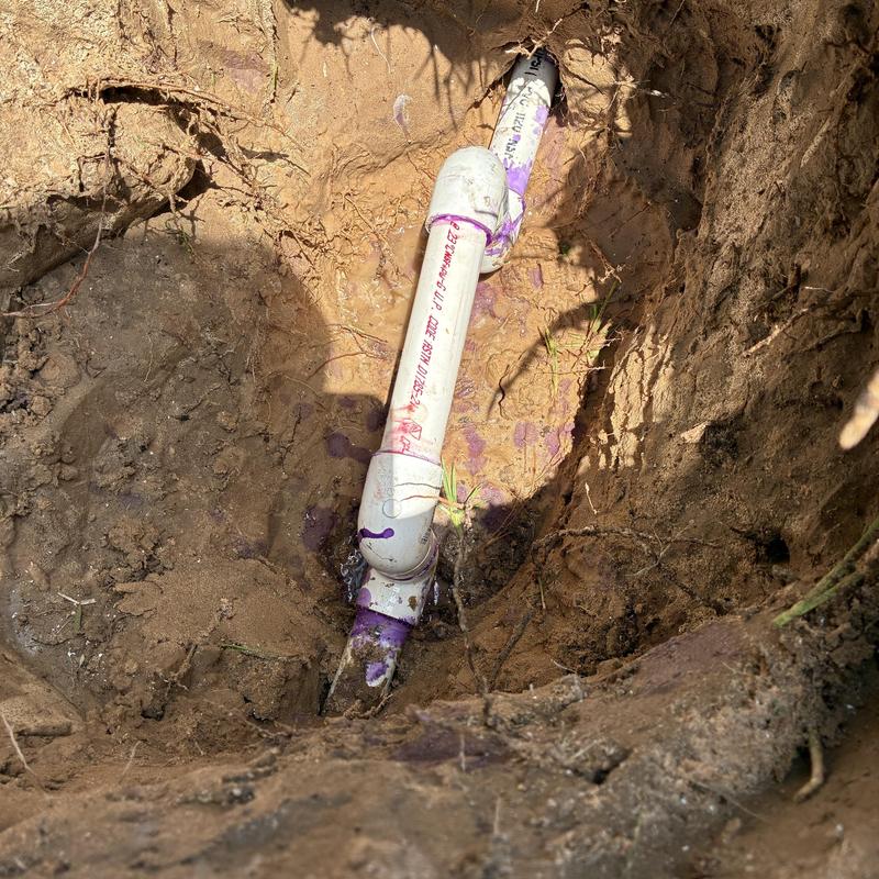 3/4 inch PVC water pipe repair in yard trench