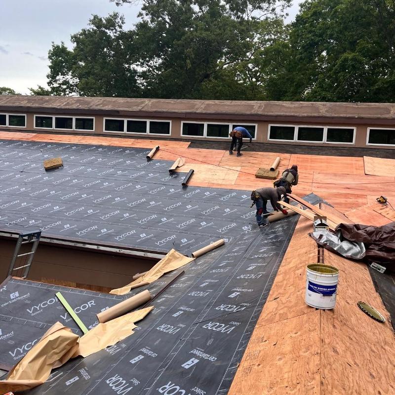 Roofing underlayment installation on wood deck roof Roofing underlayment installation on wood deck roof