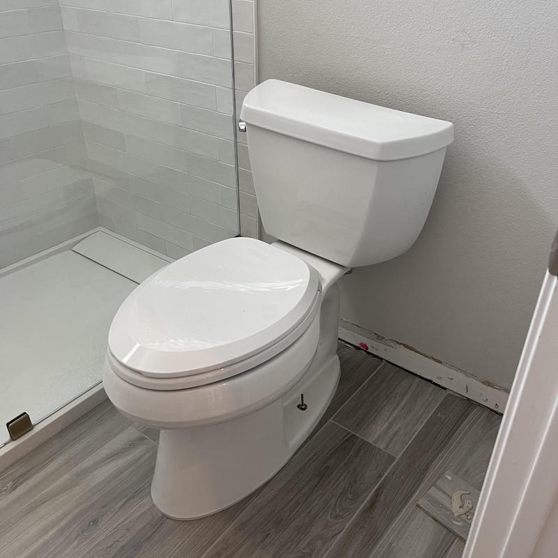 Toilet installation with new wax ring and supply line