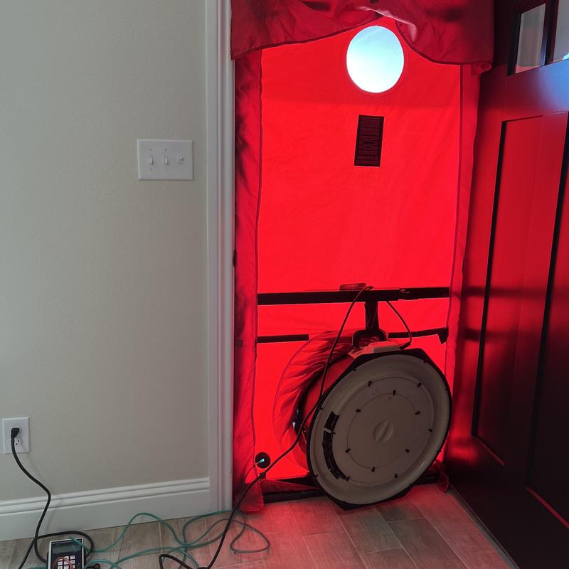 Blower door air leakage test setup at front door