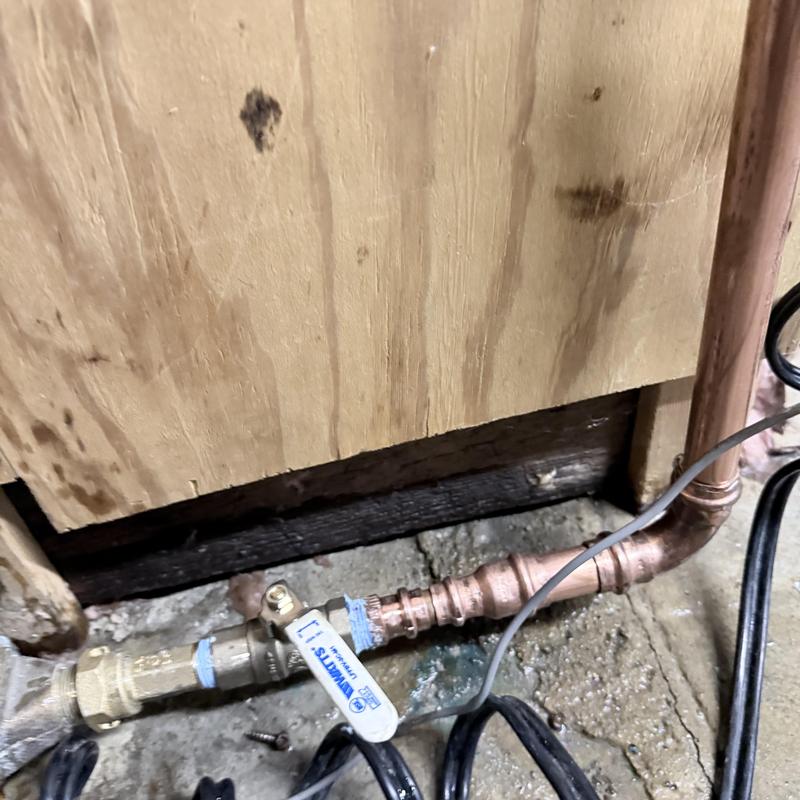 Main water piping with emergency shut off valve installation